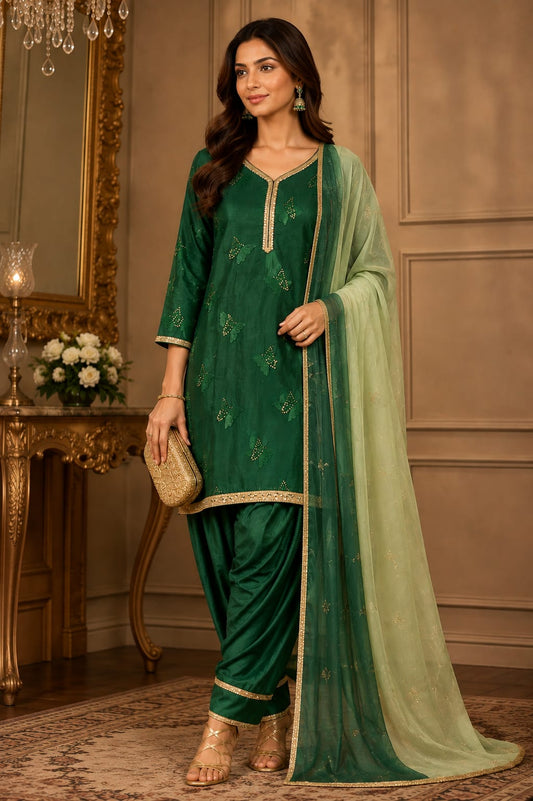 Mal chanderi bottle green kurti and farshi salwar with hand embroidery lace.
