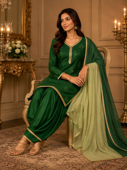 Mal chanderi bottle green kurti and farshi salwar with hand embroidery lace.