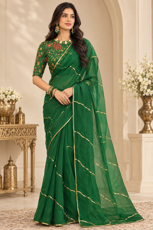 Bottle green silk organza saree with multicolour embroidered raw silk blouse