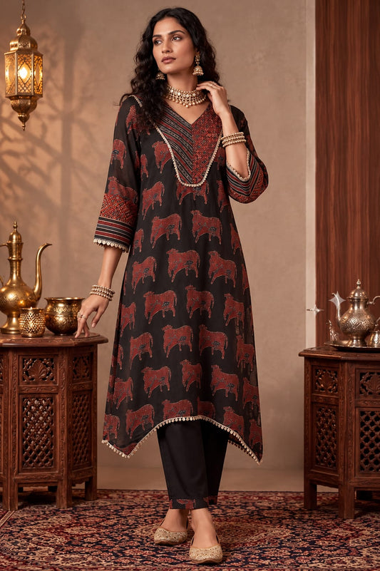 Black and maroon cow print modal silk kurti with black pant.